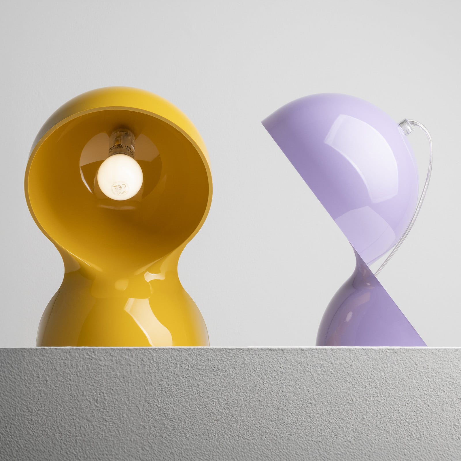 Lampa stołowa Artemide Dalú żółta wysokość 26 cm tworzywo sztuczne