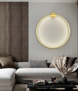 Nowoczesna lampa ścienna RING LED w kolorze złotym i czarnym. Kinkiet idealny do sypialni, salonu.