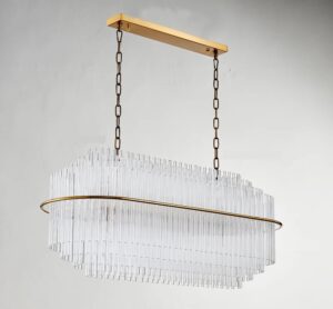 Nowoczesna szklana lampa wisząca East. Żyrandol podłużny w kolorze złotym.