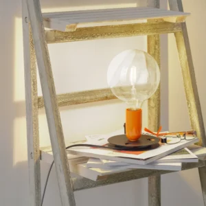 Lampa stołowa FLOS Lampadina LED pomarańczowa, podstawa czarna