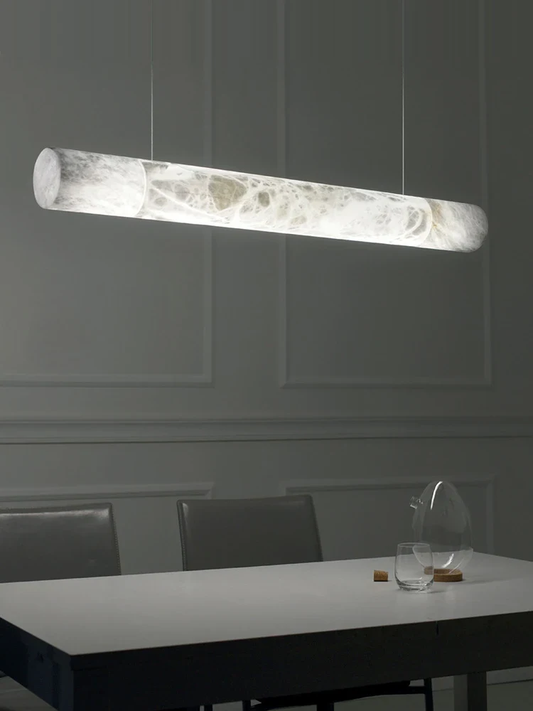Lampa wisząca LED marmurowa tuba w sześciu kształtach 3 Lampa wisząca LED marmurowa - prosta nad stołem