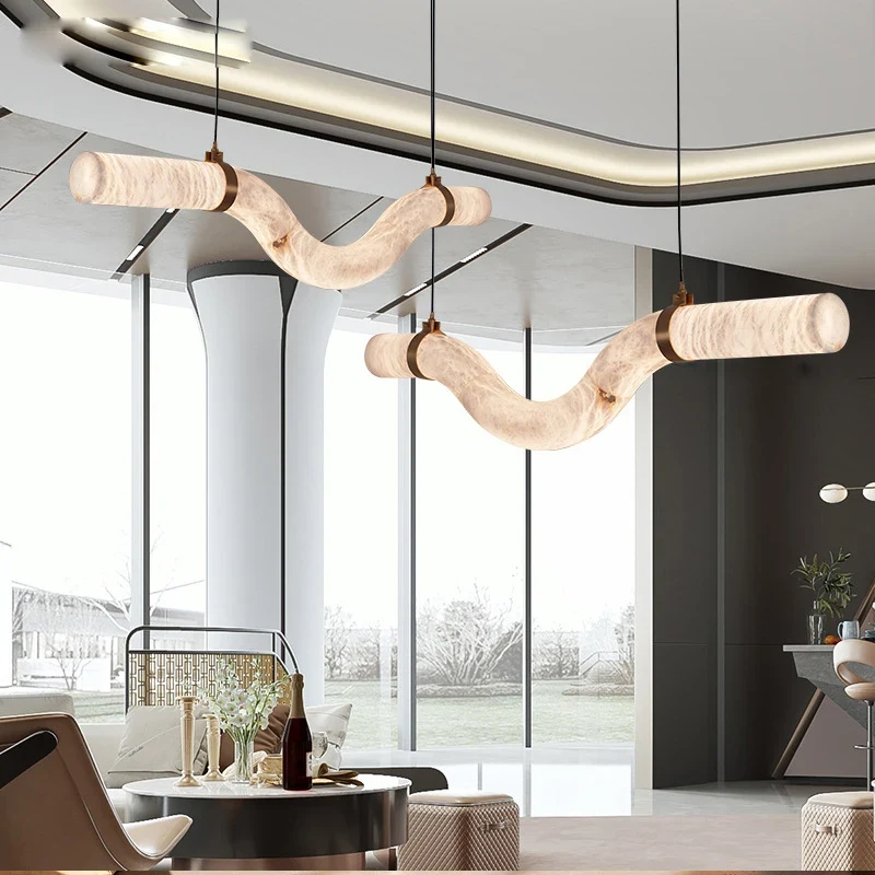 Lampa wisząca LED marmurowa tuba w sześciu kształtach 2 Lampa wisząca LED marmurowa - fala w salonie